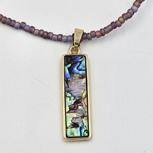 Handcrafted Gold and Blue Pendant Necklace